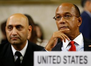 U.S. Ambassador Wood waits next to U.S. Army Captain Morris before their address on North Korea to the Conference on Disarmament in Geneva