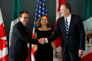 Mexico’s Economy Minister Guajardo shakes hands with U.S. Trade Representative Lighthizer before the start of a trilateral meeting with Canada’s Foreign Minister Freeland during the third round of NAFTA talks in Ottawa