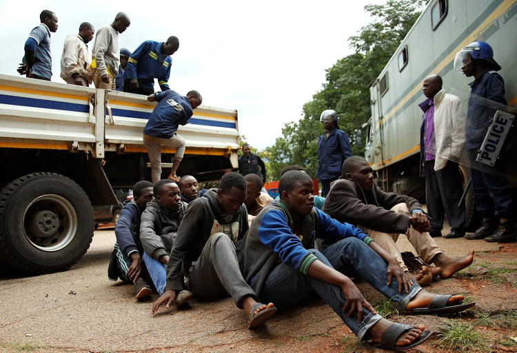 Scores arrested, beaten, as police, protesters clash in Zimbabwe