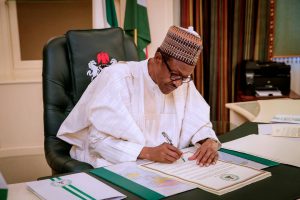 Buhari-Signs (1)