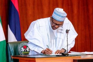 President-Buhari-signs-1_750x499