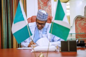 buhari_signs_750x499