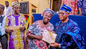 OYETOLA PRESENTS N1.156B BOND CERTIFICATES TO RETIREES