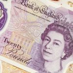 People in UK race to exchange paper banknotes before deadline