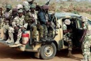 TROOPS ARREST HOODLUMS