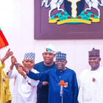 President Tinubu presents flags to APC Candidates for Imo, Kogi, Bayelsa