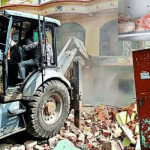 Indian authorities demolish homes of 11 persons after discovery of beef in fridges