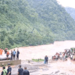 Over 60 people missing after landslides sweep two buses into river in Nepal