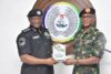 Brigadier General Olakunle Nafiu and IGP Tunji Disu